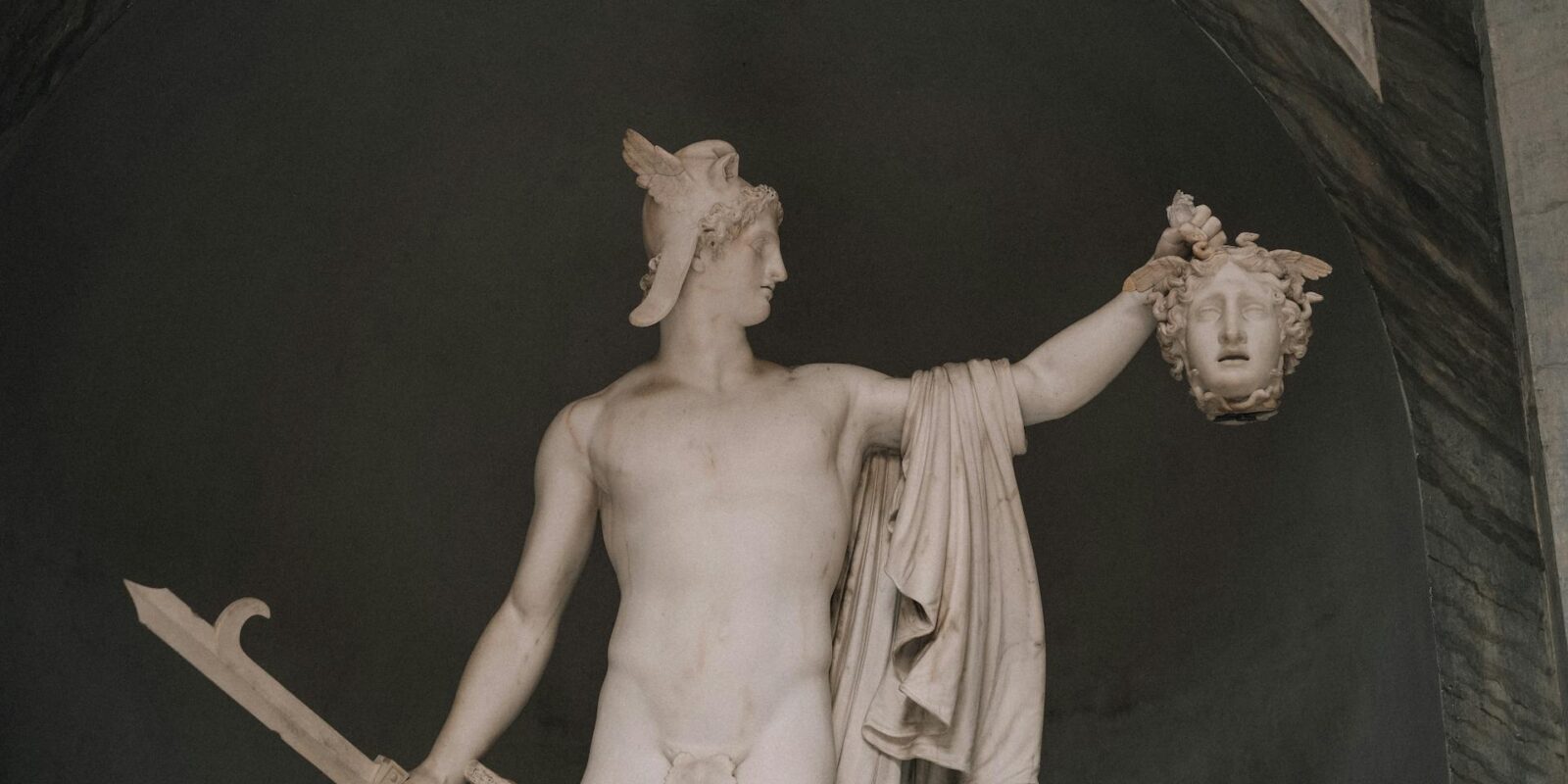 Sculpture of Perseus Holding the Severed Head of Medusa in Vatican Museum, Rome Italy