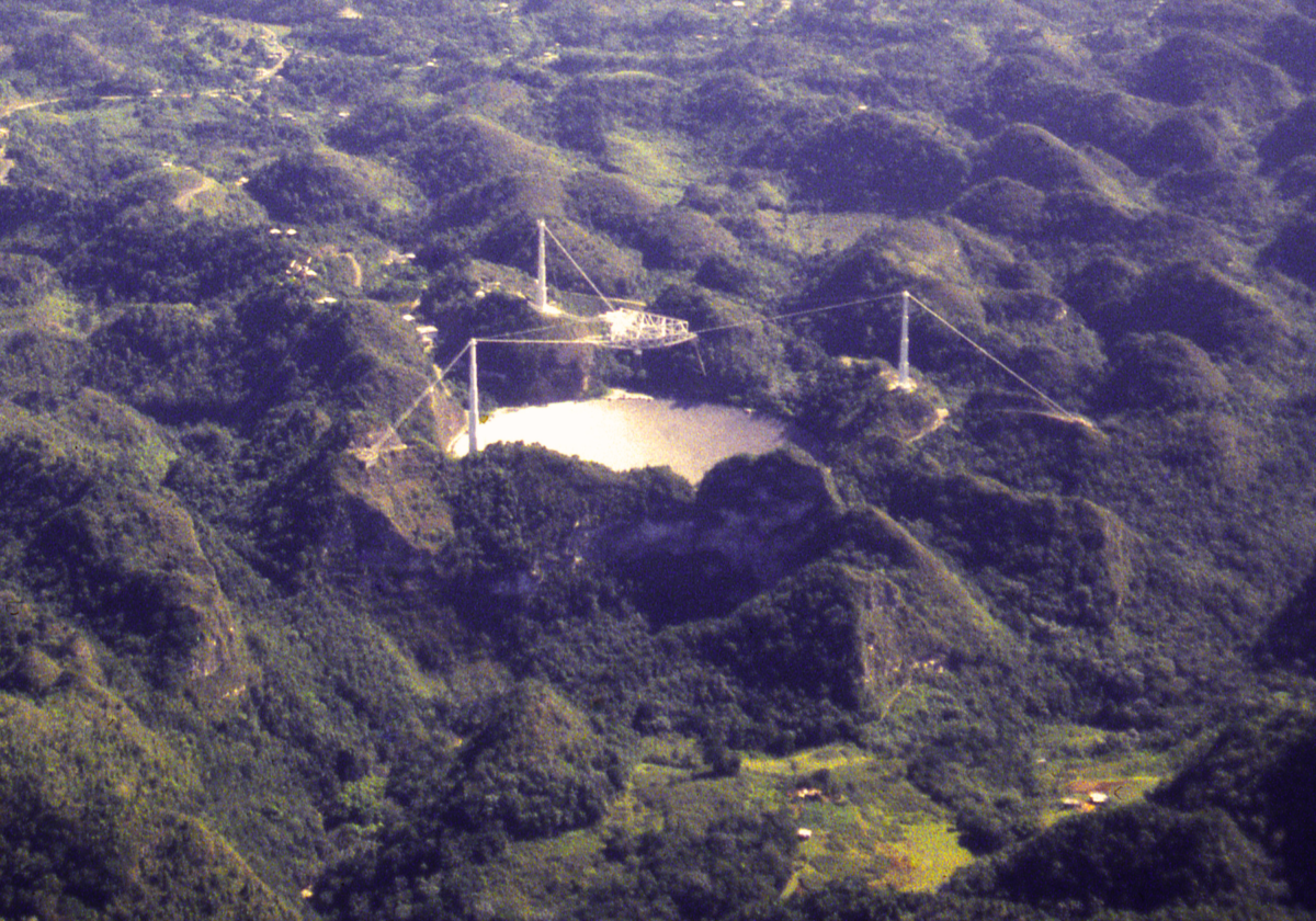 Renowned observatory with radio telescope in Arecibo Puerto Rico View more by Robert_Ford from Getty Images Signature